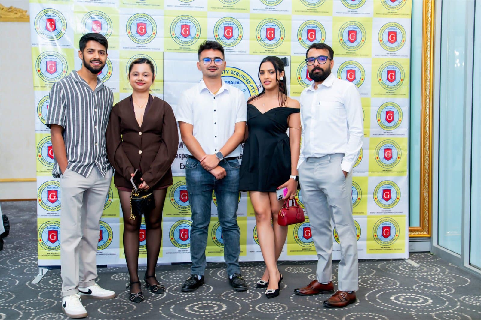 Staff posing together at GFS annual party